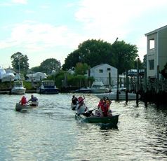 Several canoes maneuvering